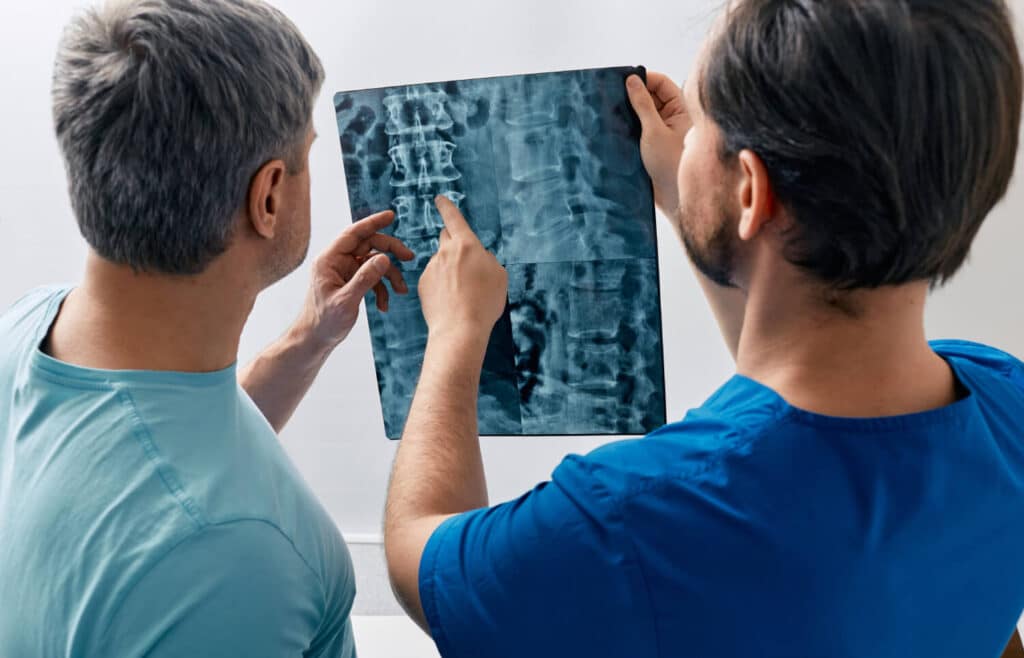 Understanding Back and Neck Injuries in Illinois Workers’ Comp and Personal Injury Cases